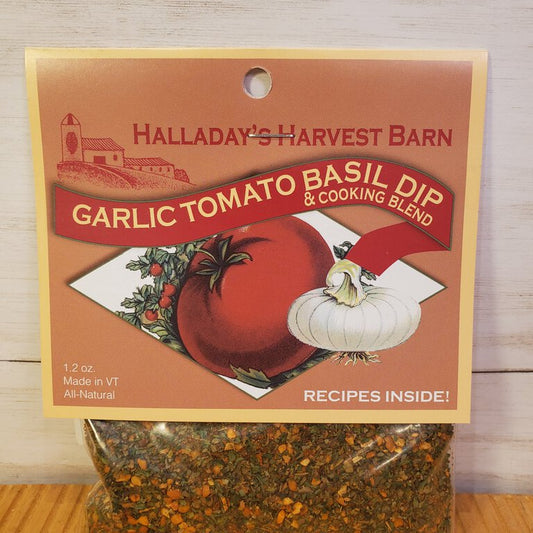Halladay's Harvest Barn Garlic Tomato Basil Dip packaging on a wooden surface