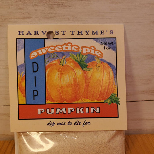 Harvest Thyme's Sweetie Pie Pumpkin Dip mix packaging on a wooden surface