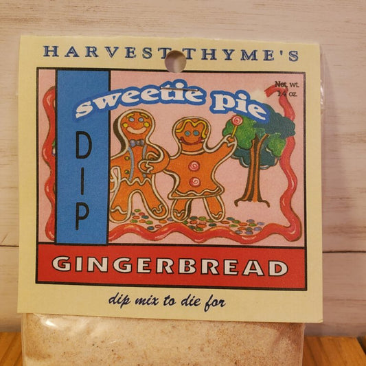 Packaging of Harvest Thyme's sweetie pie gingerbread dip mix on a wooden surface