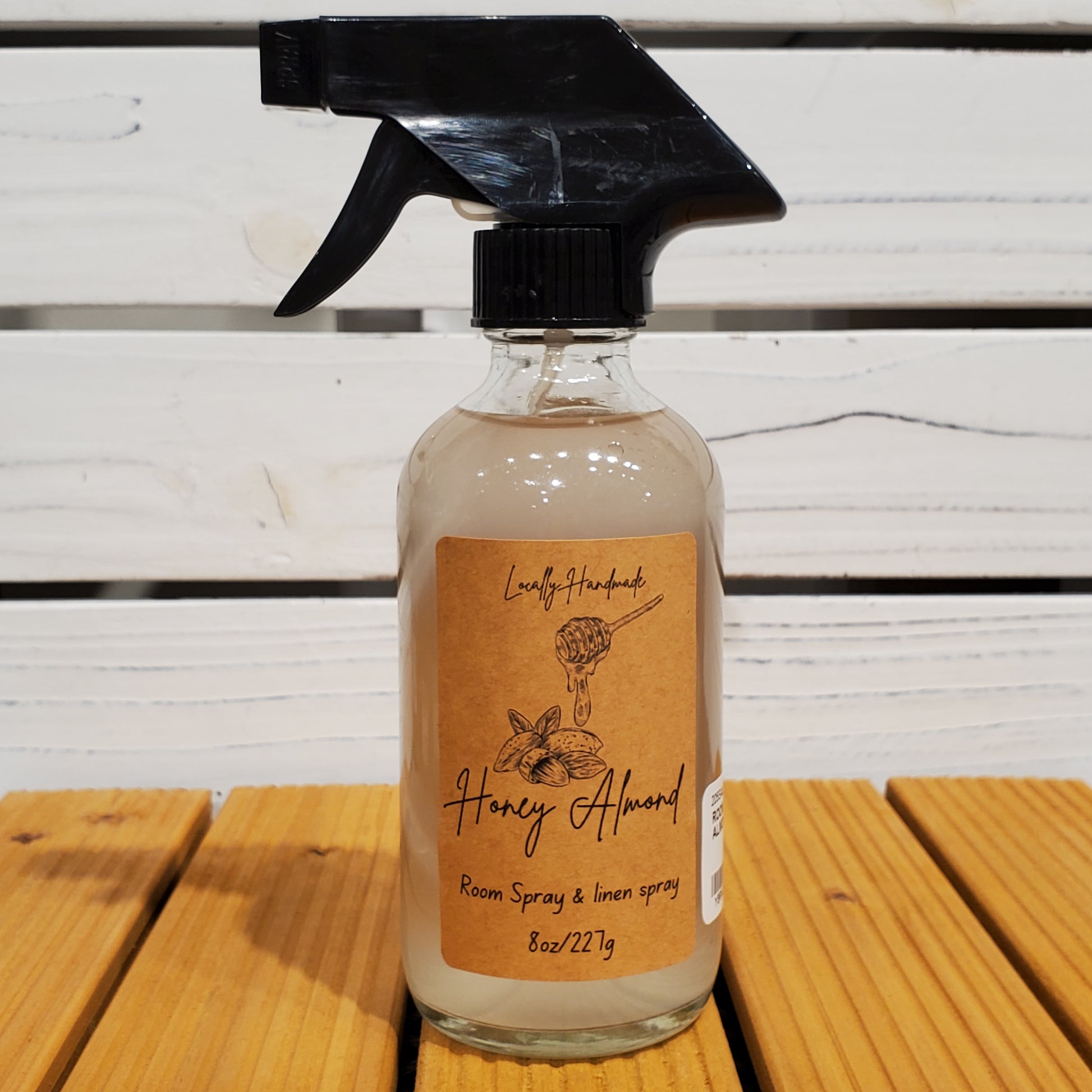 Bottle with a label on a wooden surface