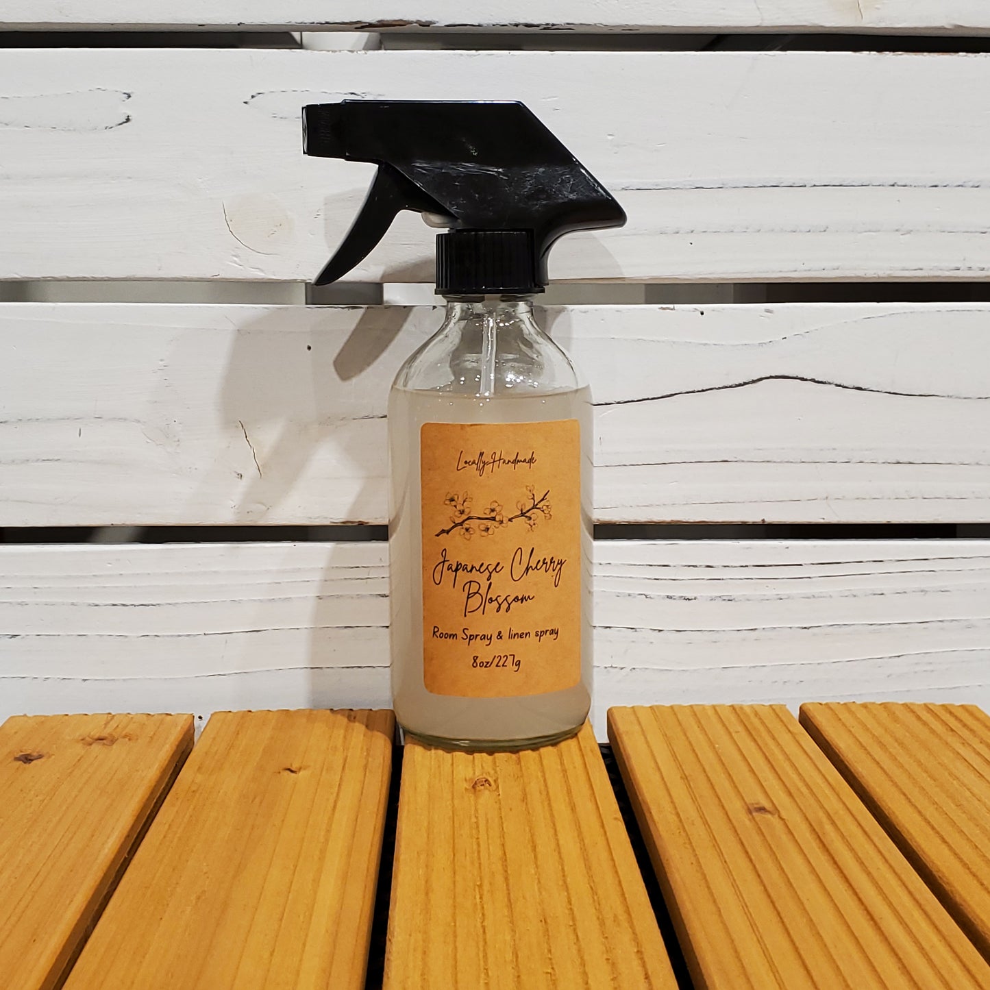 Bottle with a label on a wooden surface