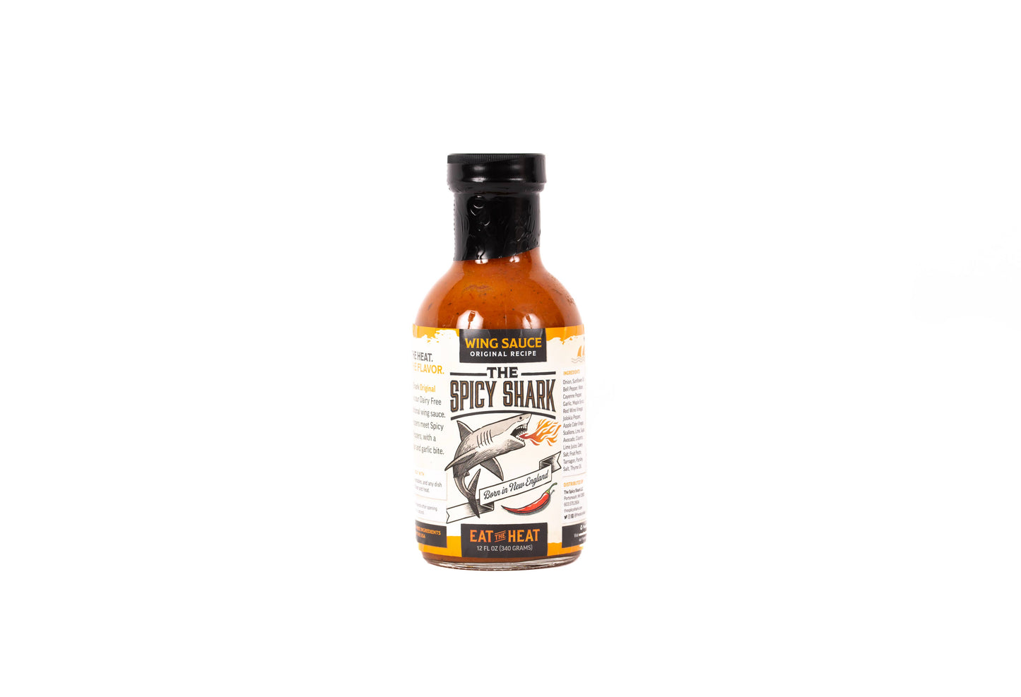 A bottle of Wing Sauce Hot Honey Sauce, specifically 'The Spicy Shark' flavor, featuring a black cap and a white label with a shark illustration, set against a plain white background.