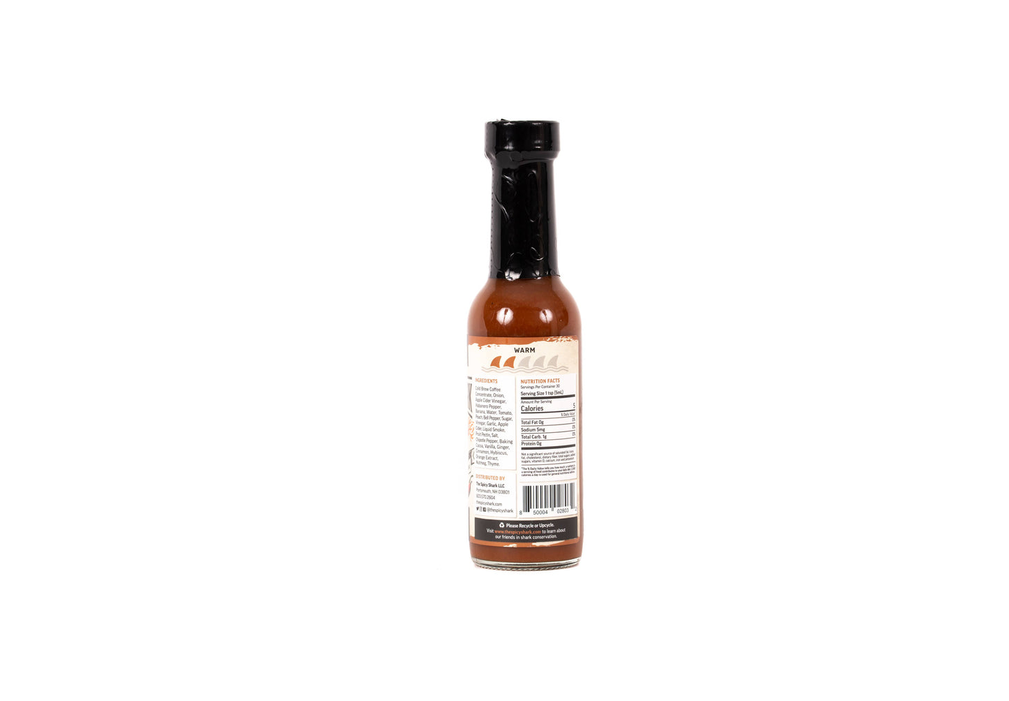 Hot sauce bottle with label on a white background