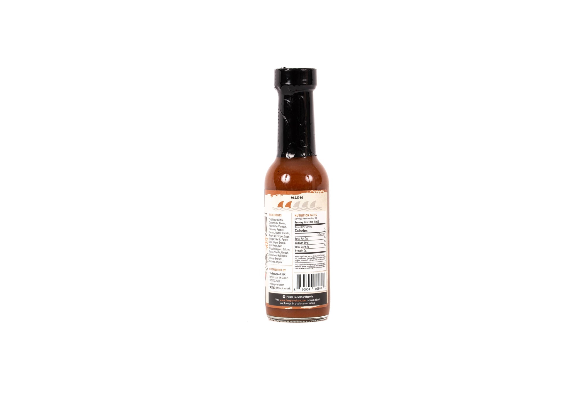 Hot sauce bottle with label on a white background