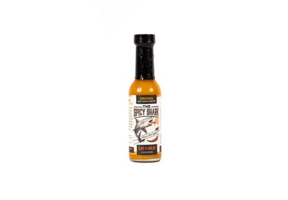 Spicy shark hot sauce bottle on a white background