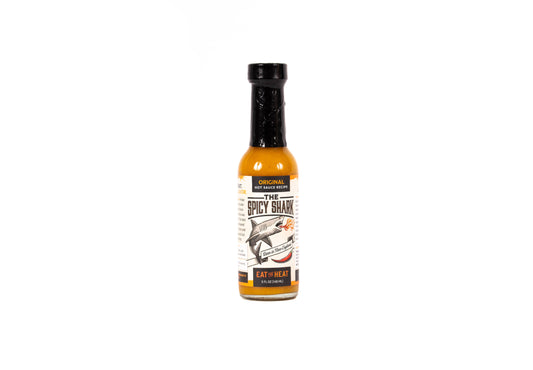 Spicy shark hot sauce bottle on a white background