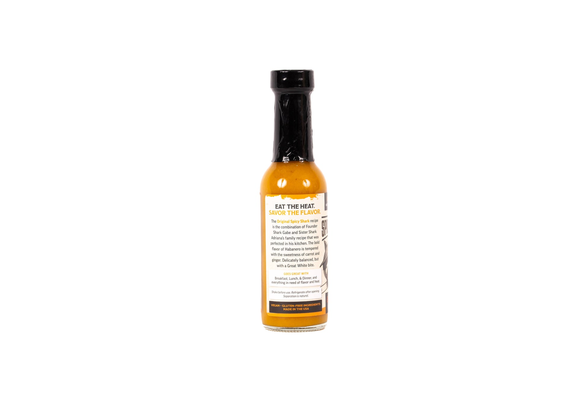 Hot sauce bottle with label on a white background