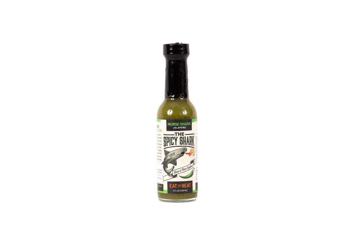 Bottle of spicy sauce with a label on a white background