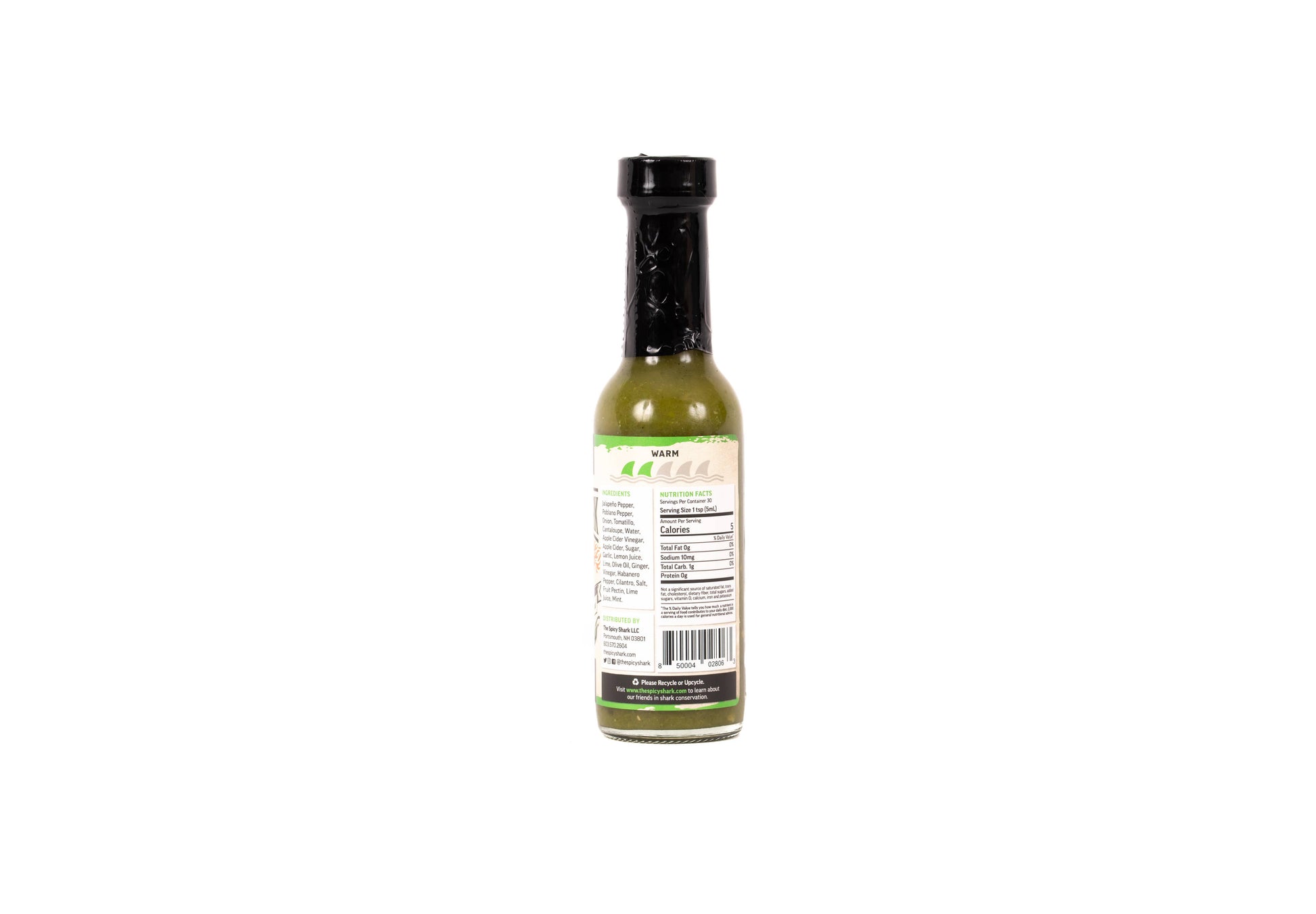 Bottle of sauce with a label on a white background