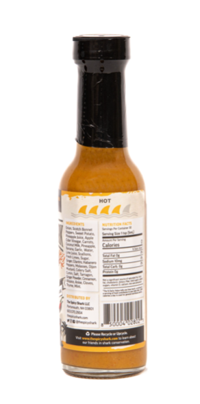 Hot sauce bottle with label on a white background
