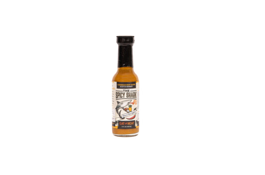 Hot sauce bottle with label on a white background