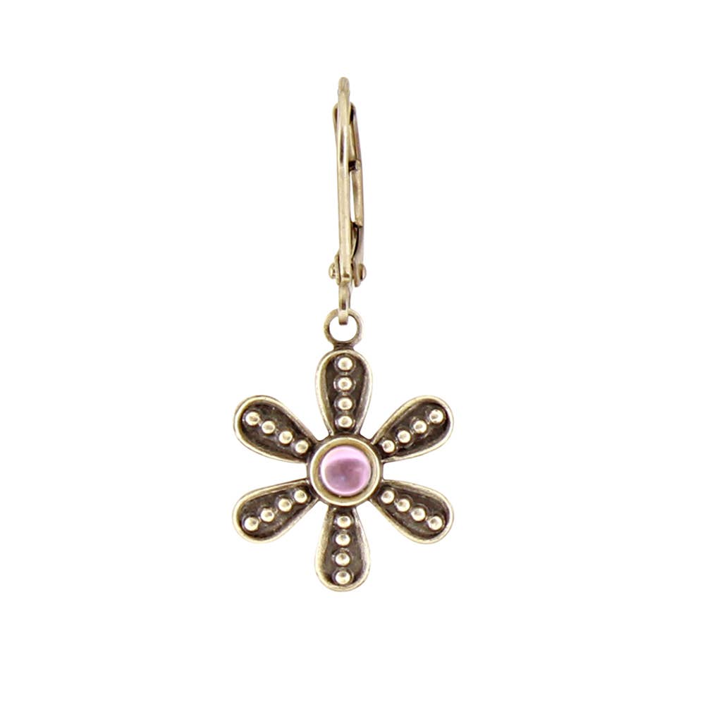 Gold flower-shaped earring with a pink center on a white background