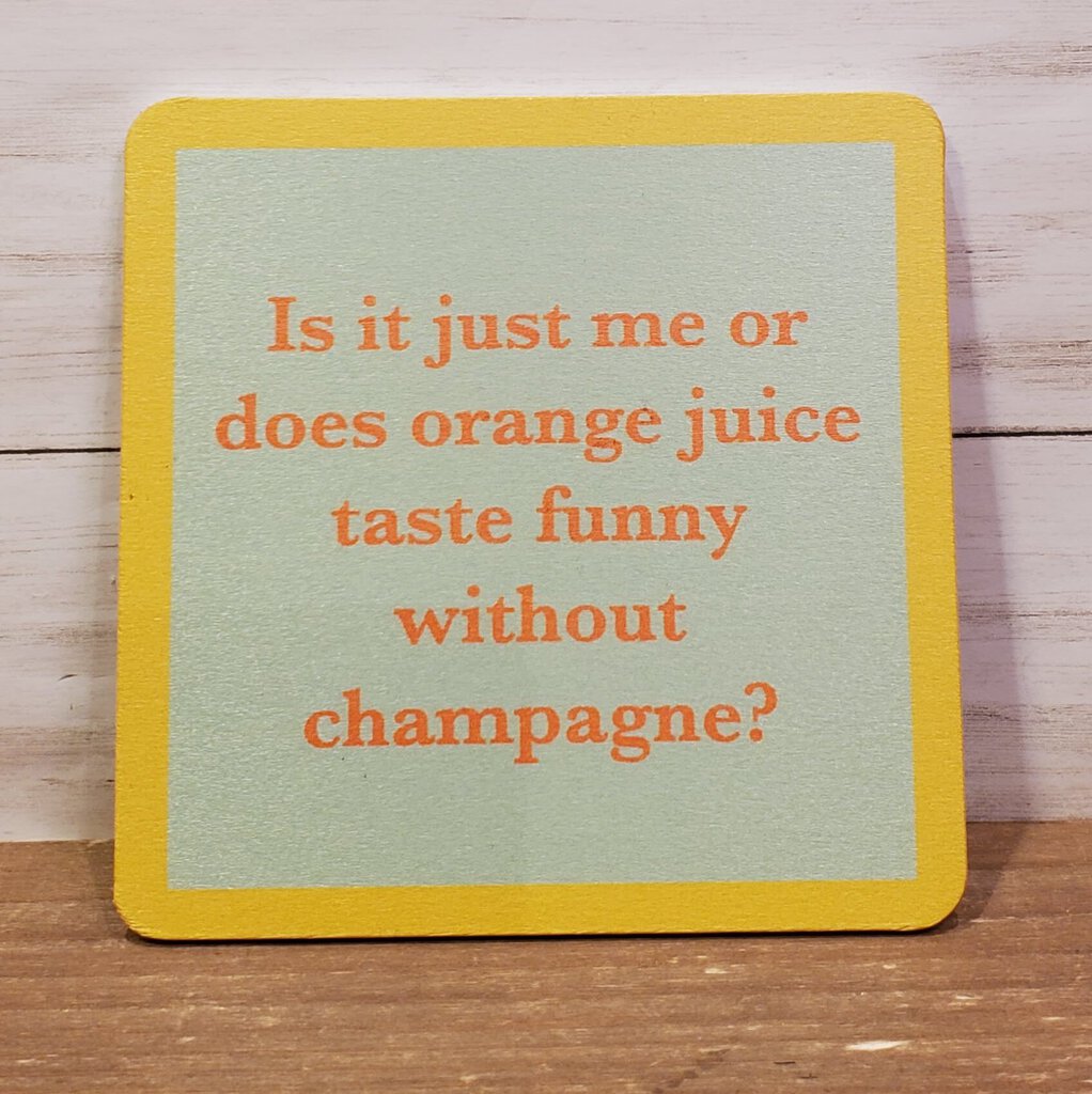 A square coaster with yellow edges and a green center, with text on the green area that reads: 'Is it just me or does orange juice taste funny without champagne?'.
