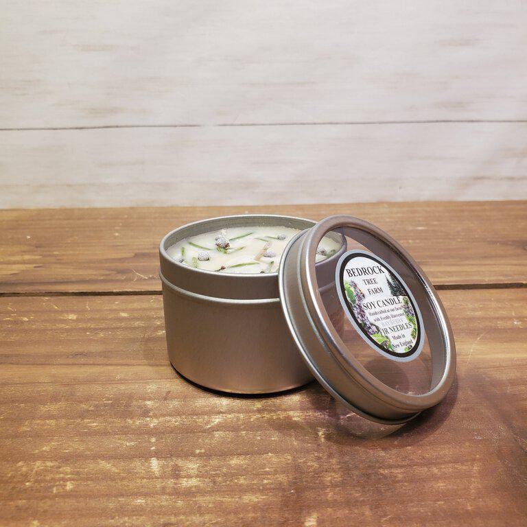 Candle tin on wood table