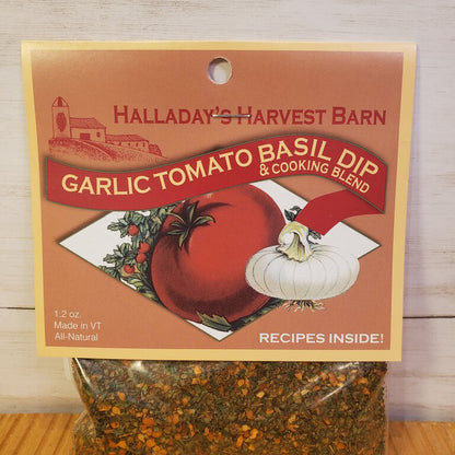 Halladay's Harvest Barn Garlic Tomato Basil Dip packaging on a wooden surface