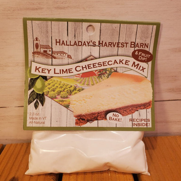 Packaging of Key Lime Cheesecake Mix by Halladay's Harvest Barn, showing the product in a white pouch with branding and a picture of a cheesecake on the front.