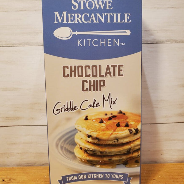 A packaged product labeled 'Stowe Mercantile Kitchen Chocolate Chip Griddle Cake Mix' with an image of chocolate chip griddle cakes on the front.