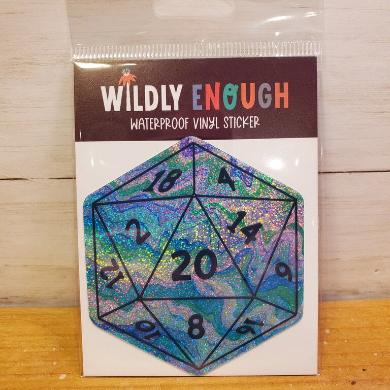 A holographic sticker designed like a 20-sided die, packaged with the brand name 'WILDLY ENOUGH'.