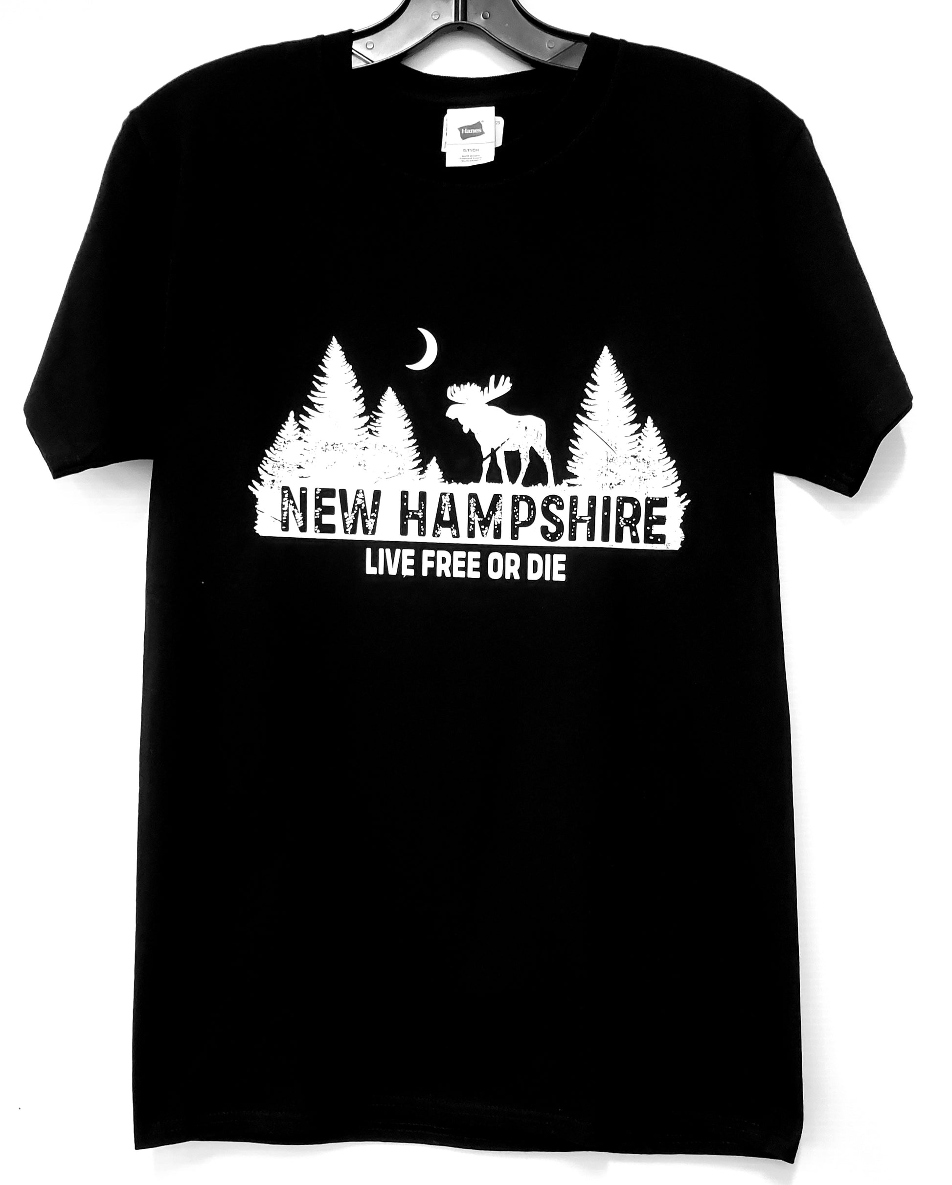 Black t-shirt with white graphic design featuring a moose and trees, text 'New Hampshire Live Free or Die', on a white background.