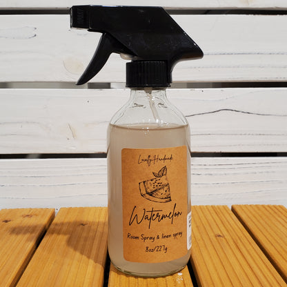 Spray bottle with a label on a wooden surface