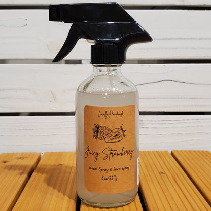 Spray bottle with a label on a wooden surface