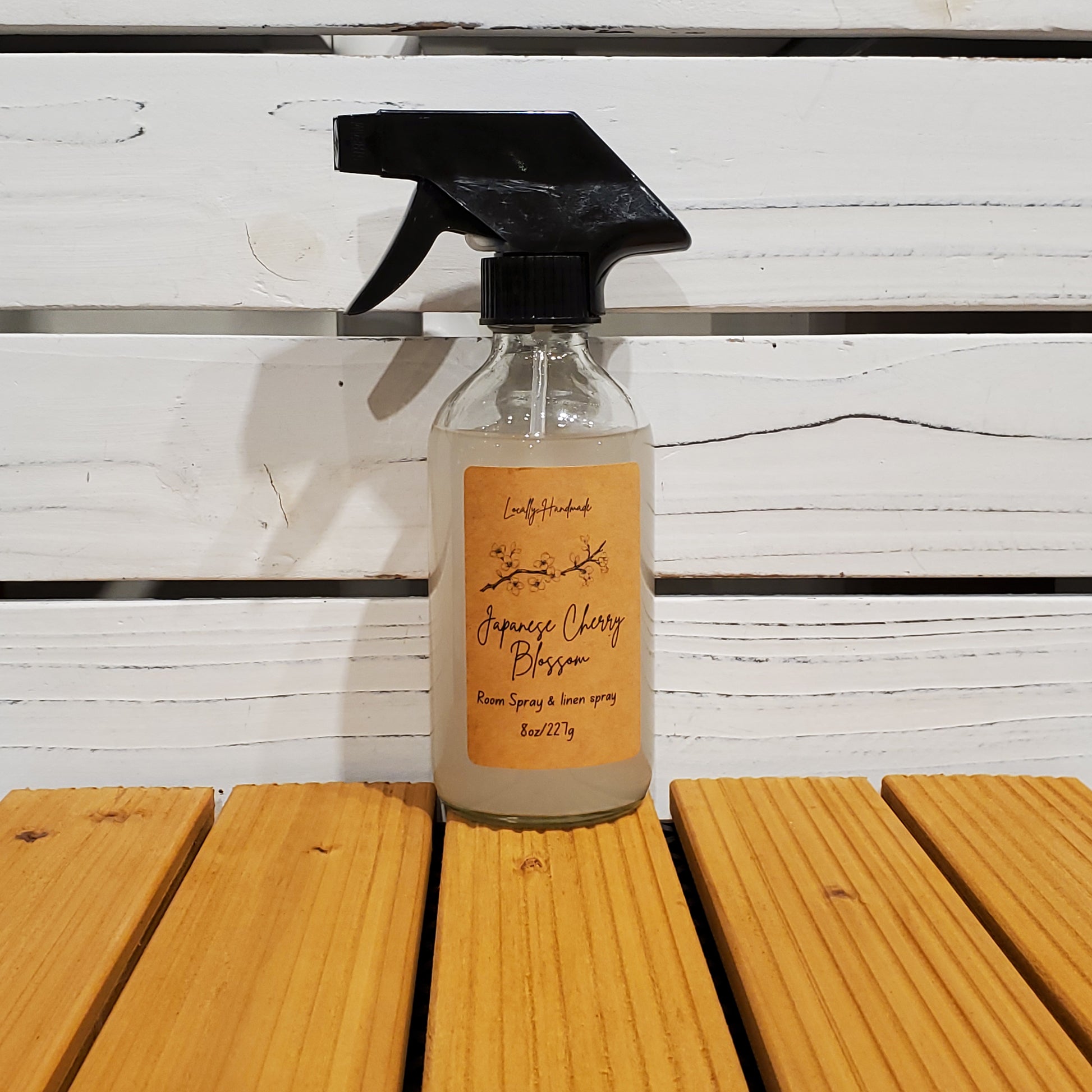 Bottle with a label on a wooden surface
