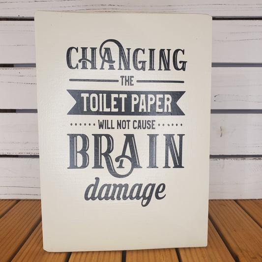 “Changing the Toilet Paper...” 8x10 White Wooden Sign.