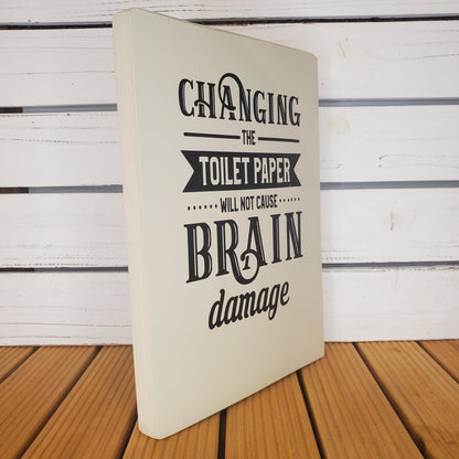 “Changing the Toilet Paper...” 8x10 White Wooden Sign.