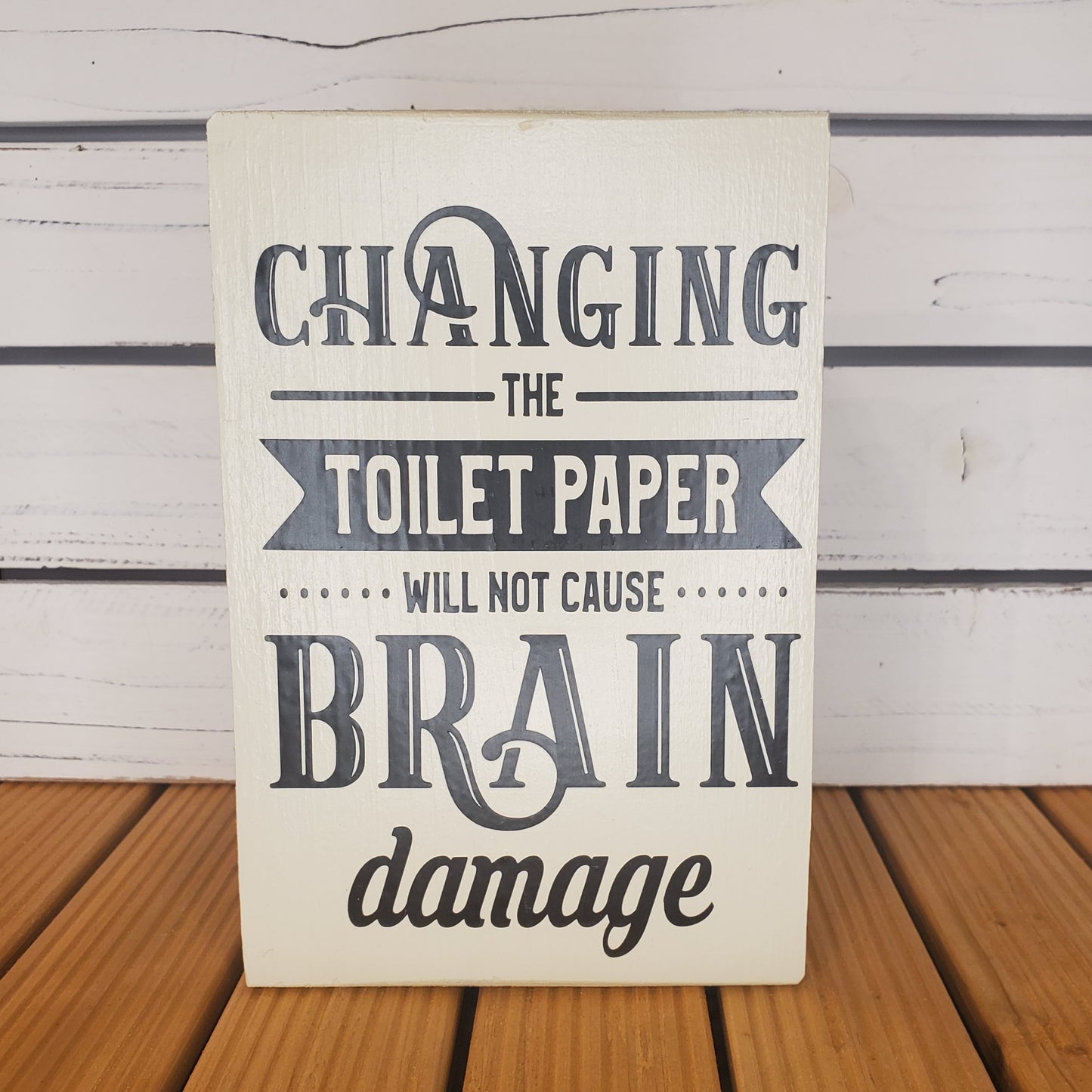 “Changing the Toilet Paper...” 6x8 White Wooden Sign.