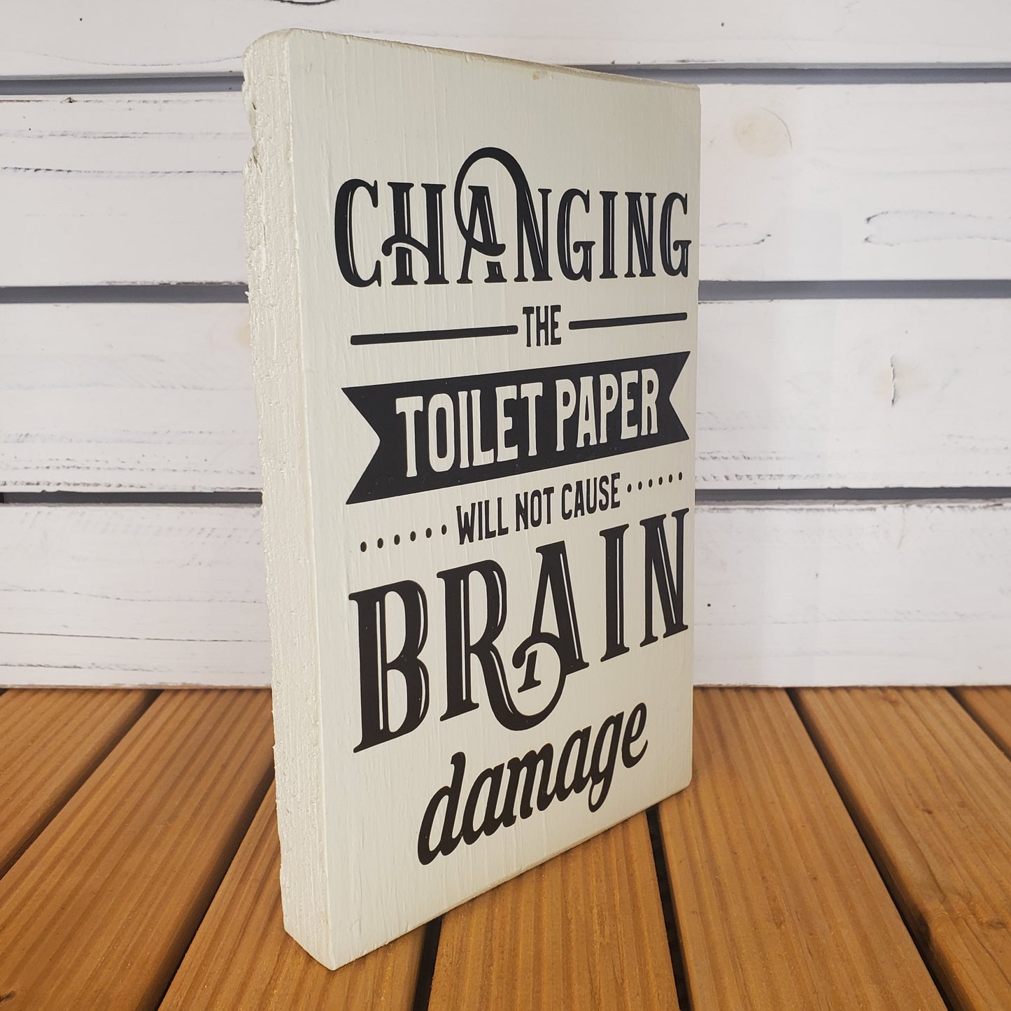 “Changing the Toilet Paper...” 6x8 White Wooden Sign.