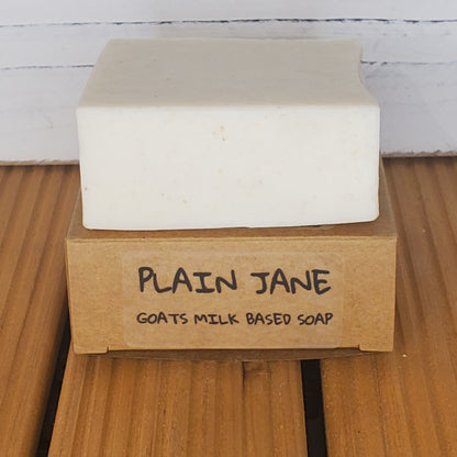Bar of soap with a 'Plain Jane' packaging on a wooden surface