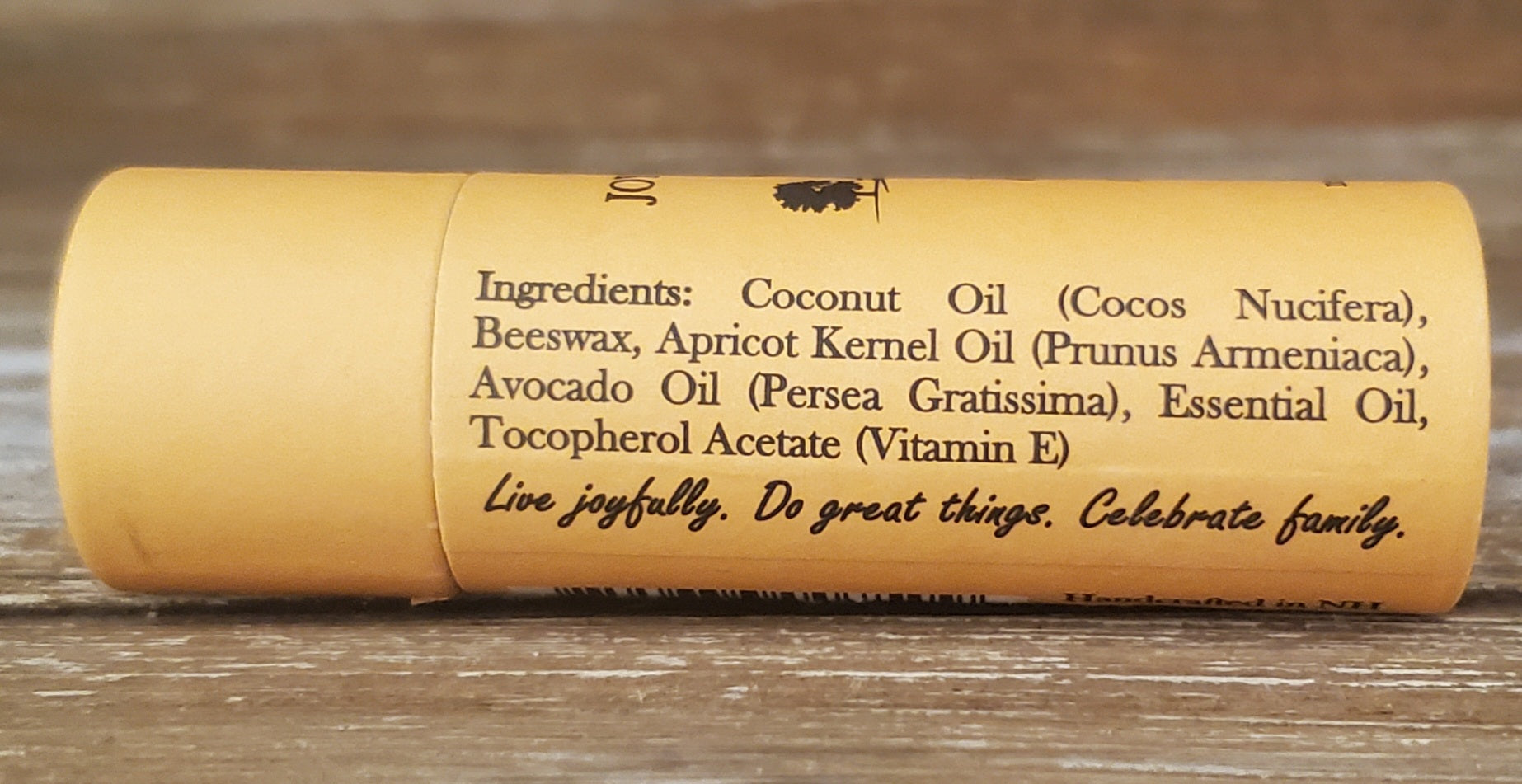 Cork with text and branding on a wooden surface
