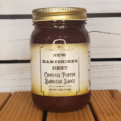 Jar of New Hampshire's Best Chiptole Porter Barbecue Sauce on a wooden surface