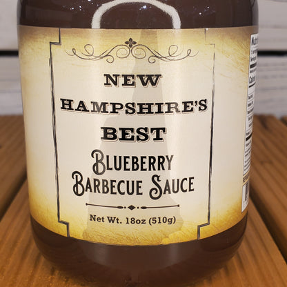 Bottle of New Hampshire's Best Blueberry Barbecue Sauce on a wooden surface