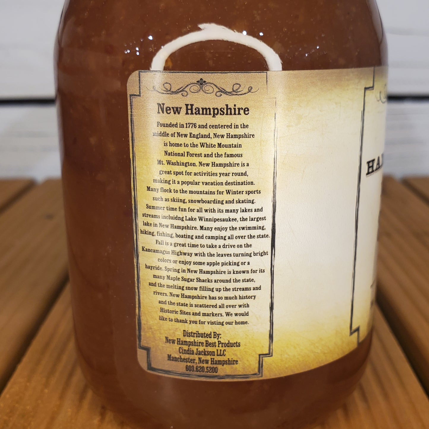Bottle with a label on a wooden surface