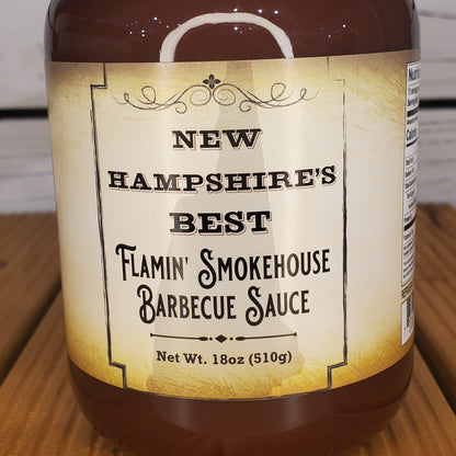 Barbecue sauce jar with label on a wooden surface