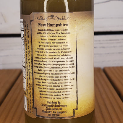 Wine bottle label with text on a wooden surface