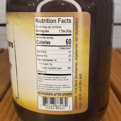 Close-up of a nutrition facts label on a jar with a wooden surface in the background.