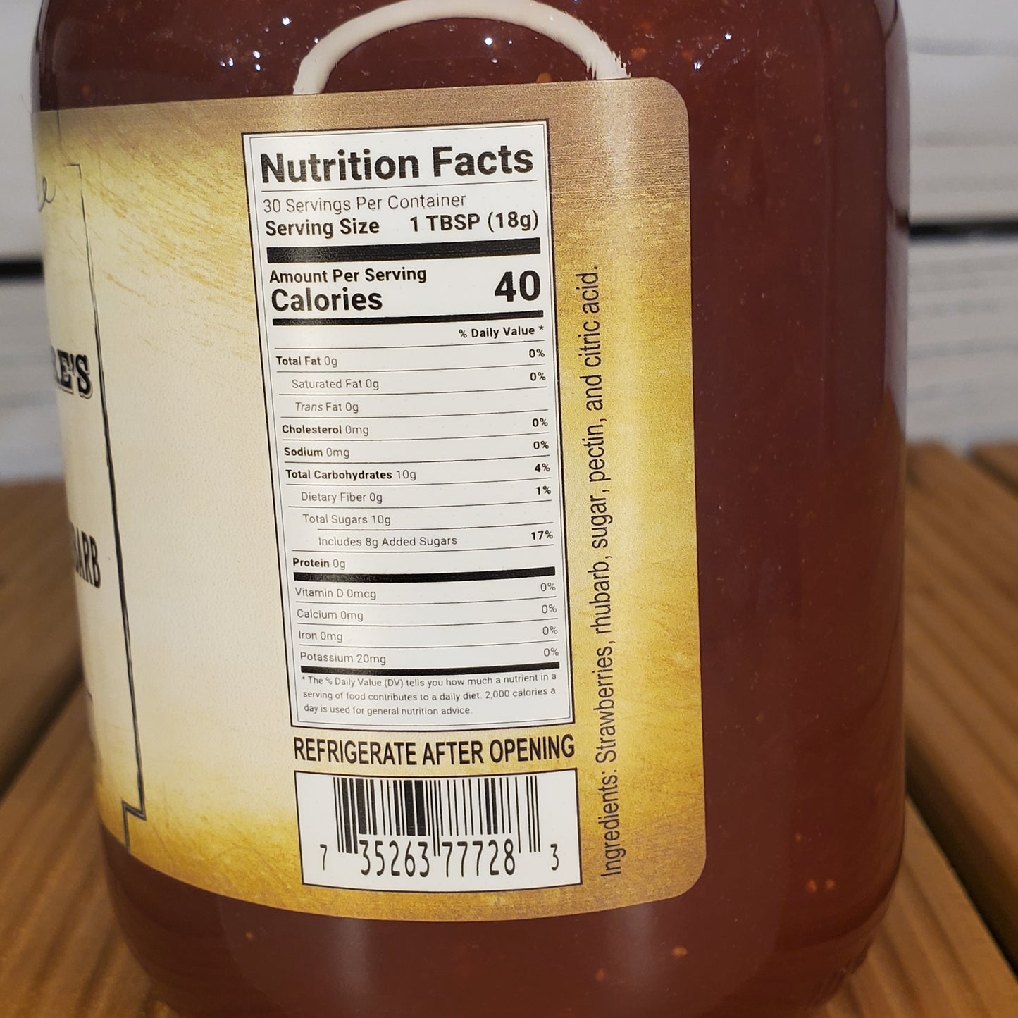 Bottle label with nutrition facts and ingredients on a brown background