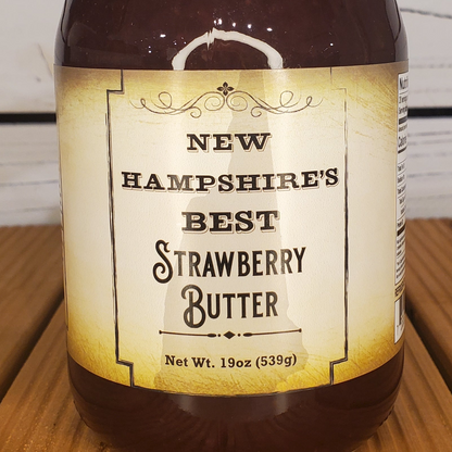 Bottle of New Hampshire's Best Strawberry Butter on a wooden surface