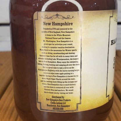 Bottle label with text on a wooden surface