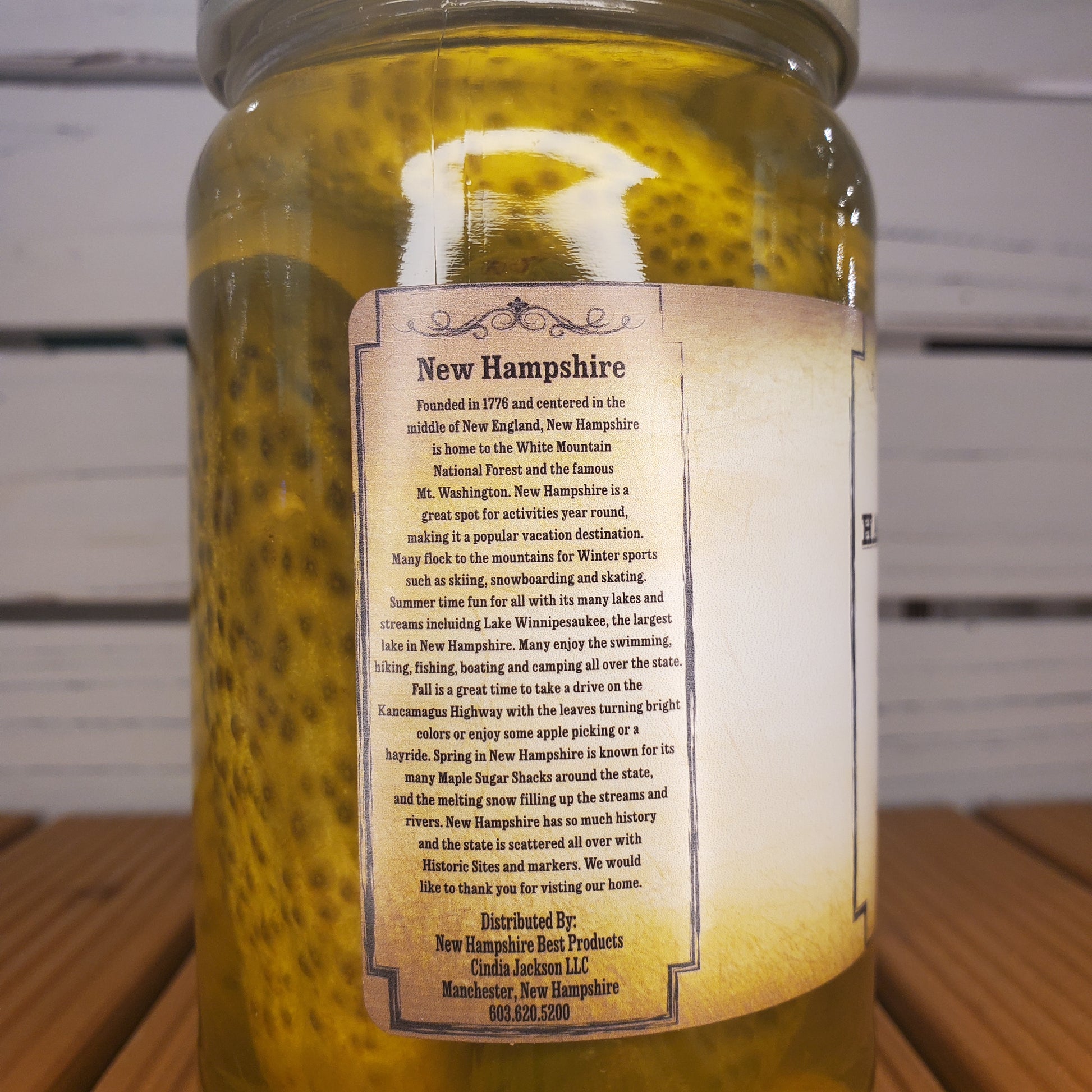 Bottle with a label on a wooden surface