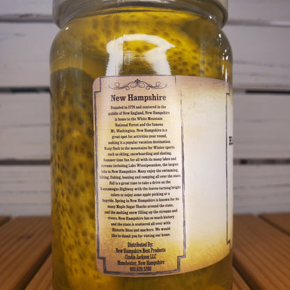 Bottle with a label on a wooden surface