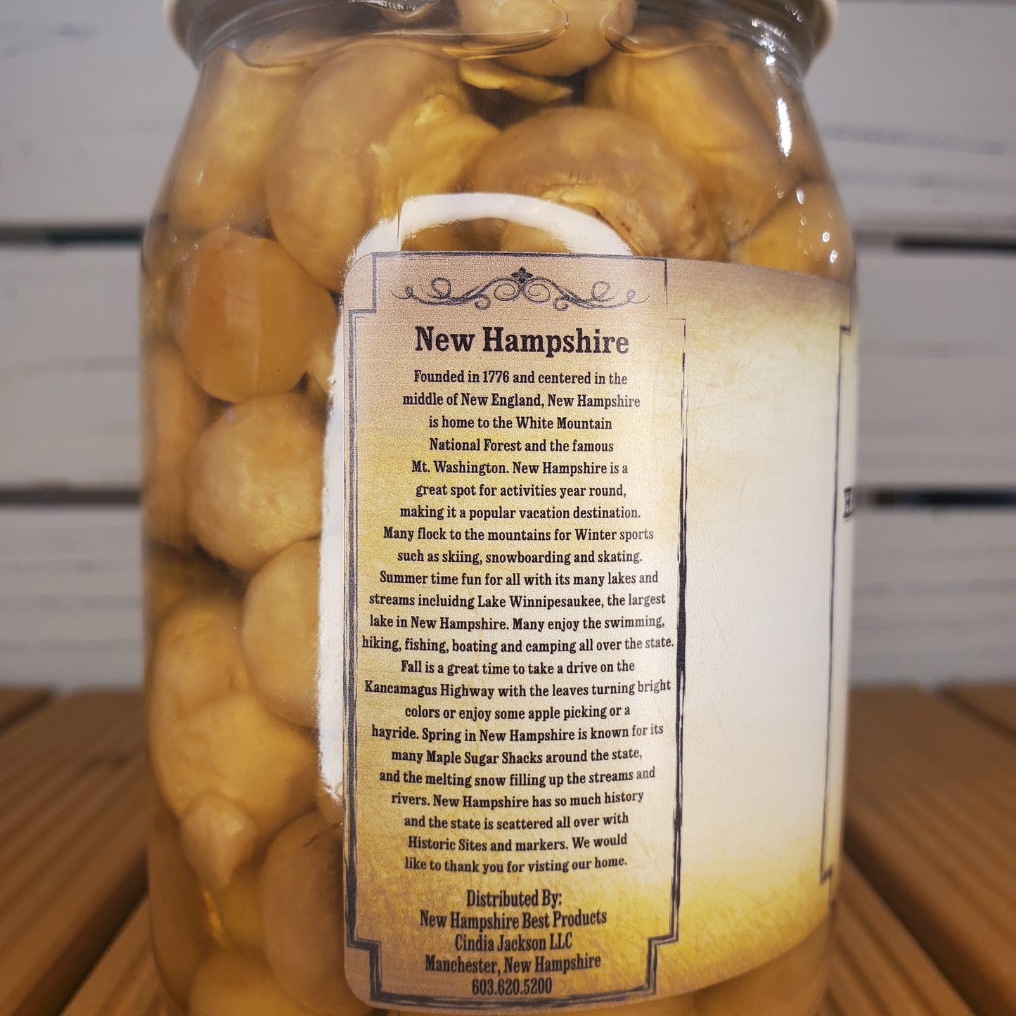 Jar of pickled vegetables with a New Hampshire fact sheet label.