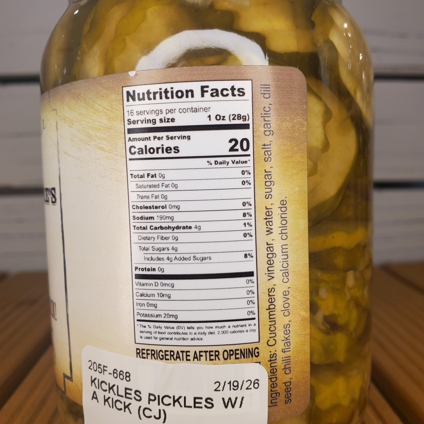 Nutrition facts label on a jar of pickles with a blurred background