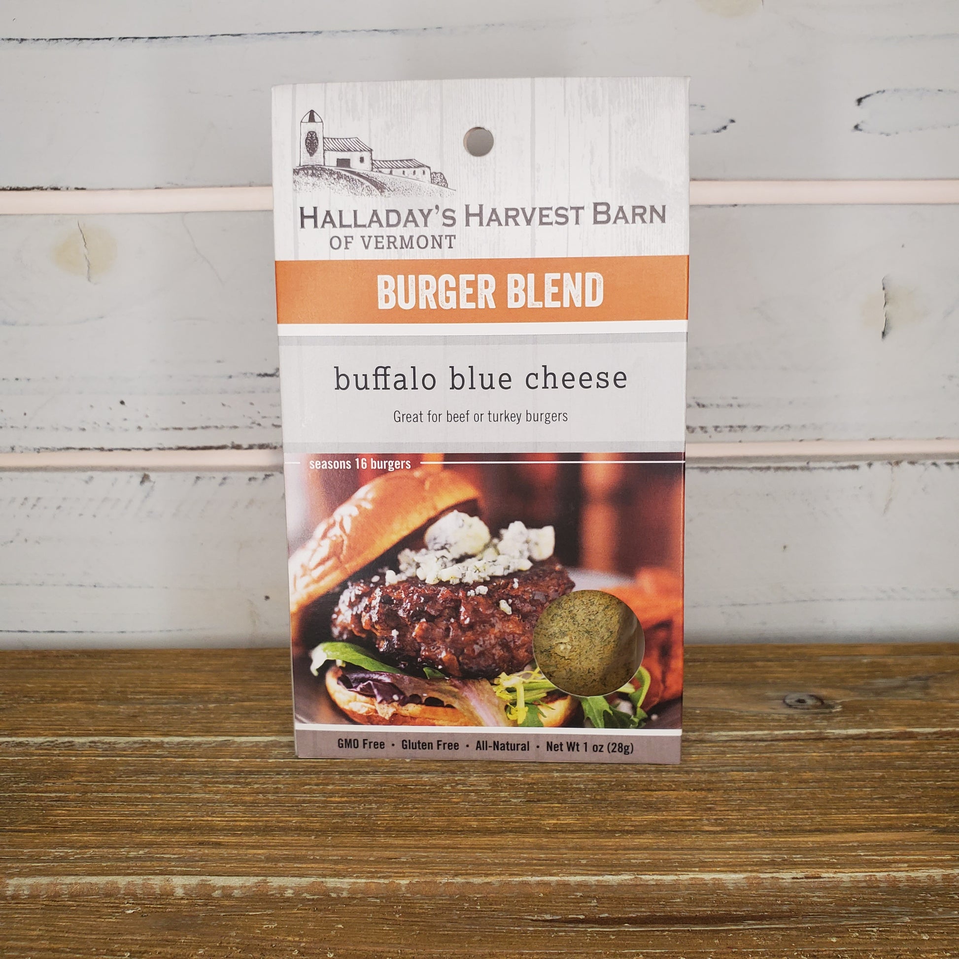 Burger blend packaging with 'Halladay's Harvest Barn' branding on a wooden surface.