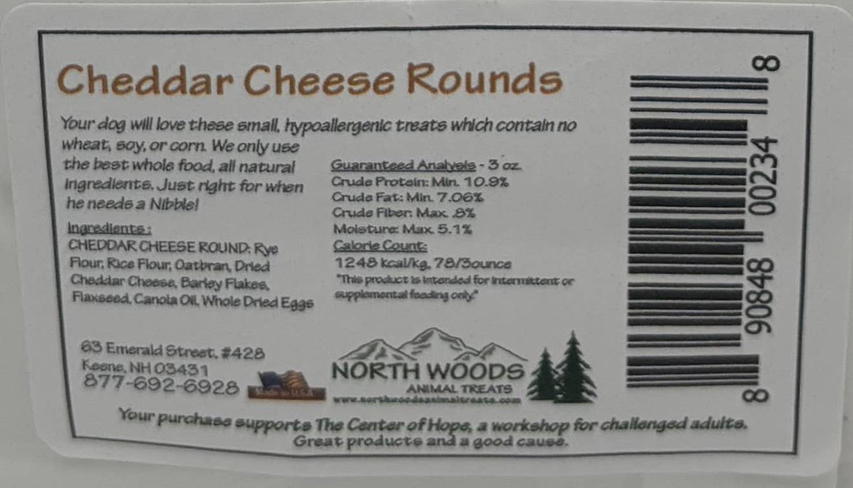 Back side of a North Woods Animal Hope Cheddar Cheese Rounds pet supplement package, showing ingredients, guarantee analysis, and a barcode on a white background.