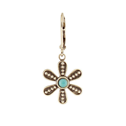 Gold flower-shaped earring with turquoise center on a white background