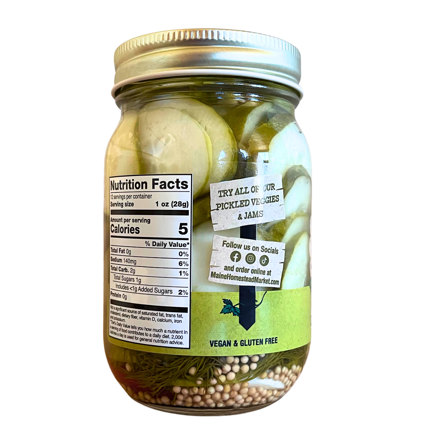 A glass mason jar filled with sliced pickled onions and herbs, sealed with a silver metal lid. The jar has a white nutrition facts label and a green sticker that reads 'VEGAN & GLUTEN FREE', set against a plain white background.