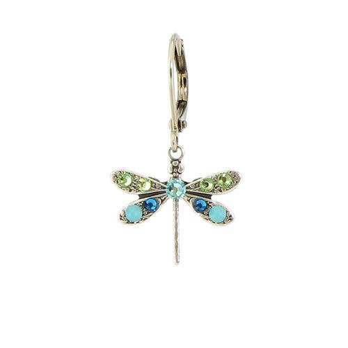 Dragonfly-shaped earring with gemstones on a white background